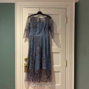 Periwinkle blue lace cocktail dress. NWT Beautiful lace detail.